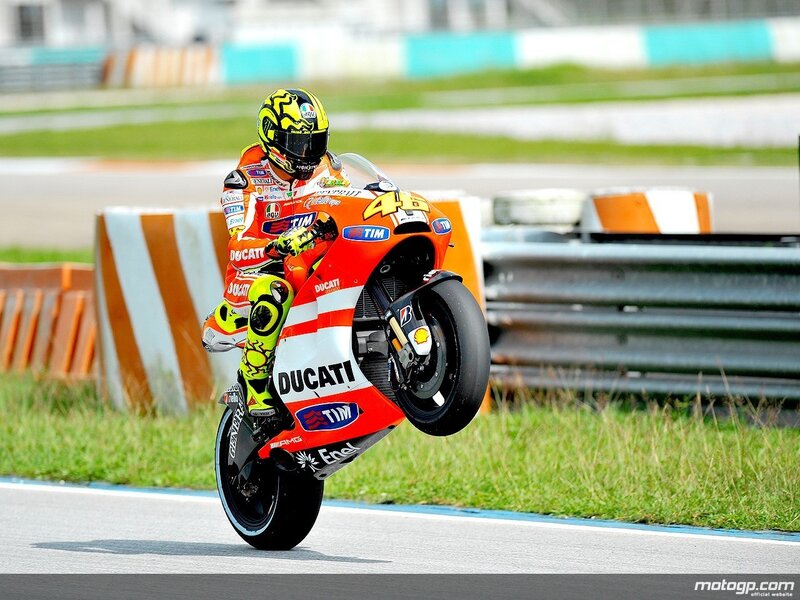 Motorcycle Racer on Track — Orange