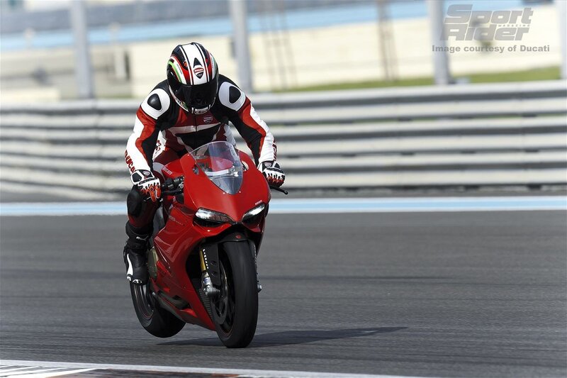 Motorcycle Racer on Track — Red, Dynamic, Afternoon, Photograph, Racetrack, Guardrail