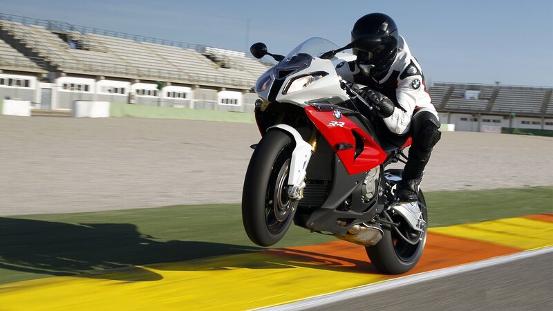 Motorcycle Racer on Track — Red, Dynamic, Afternoon, Photograph, Racetrack, Stadium, White