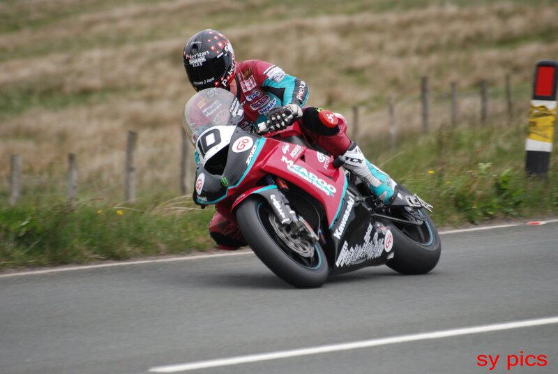 Motorcycle Racer on Track — Red, Dynamic, Afternoon, Photograph, Racing Suit