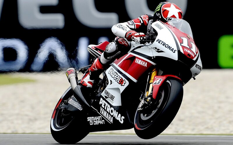Motorcycle Racer on Track — Red, Dynamic, Photograph, Racing Bike, Helmet, White, Black