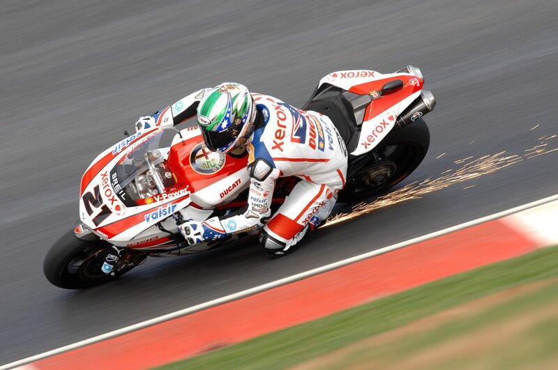 Motorcycle Racer on Track — Red, Dynamic, Photograph, Racing Suit, Sparks