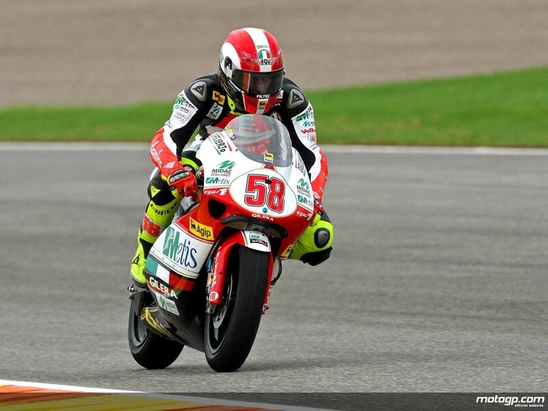 Motorcycle Racer on Track — Red, Focused