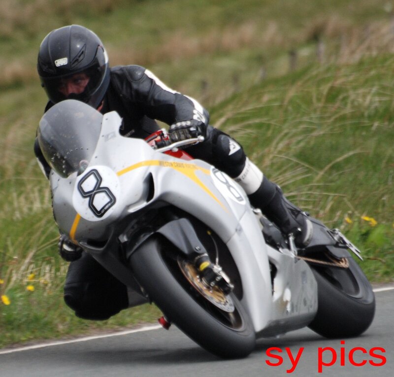 Motorcycle Racer on Track — Silver