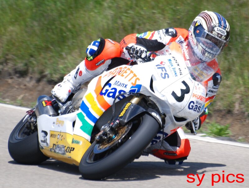 Motorcycle Racer on Track — White, Dynamic, Afternoon, Photograph, Racing Suit