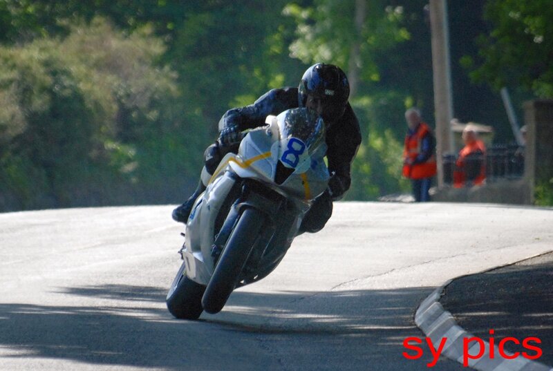 Motorcycle Racer on Track — White, Dynamic, Afternoon, Photograph