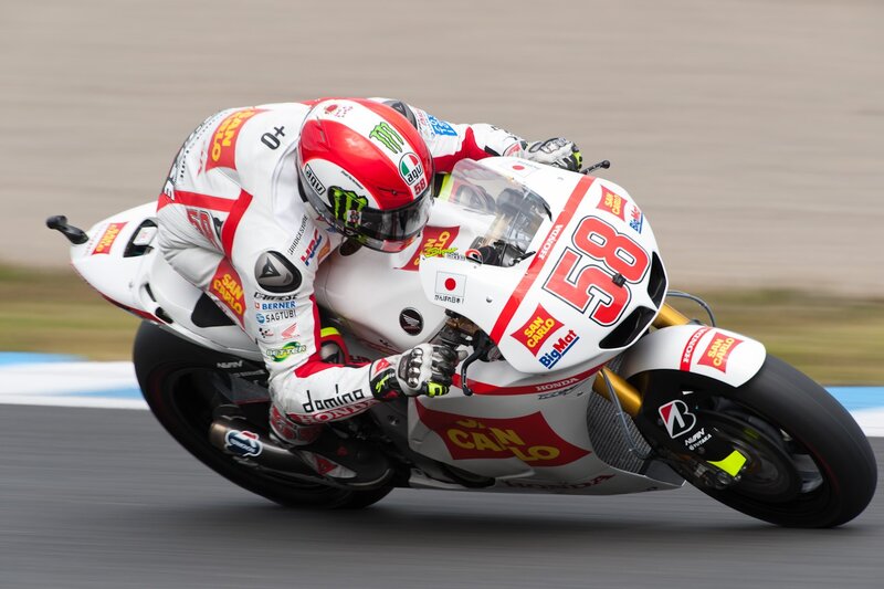 Motorcycle Racer on Track — White, Dynamic, Photograph, Racing Suit, Helmet, Red, Black