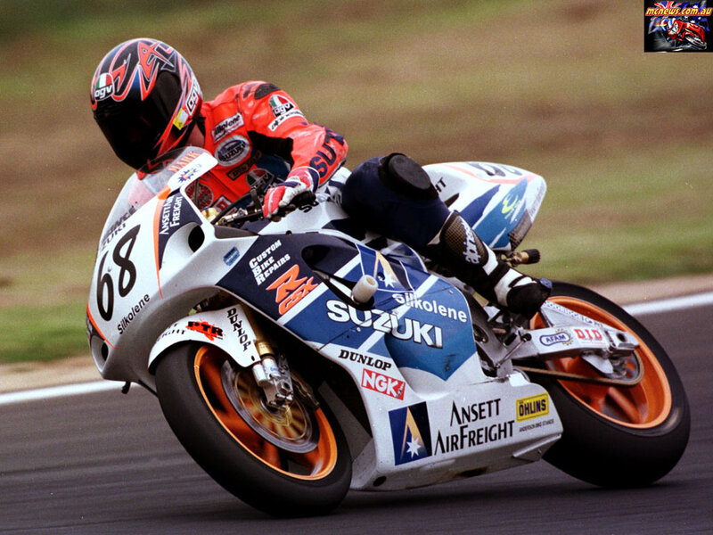 Motorcycle Racer on Track — White, Dynamic, Photograph, Racing Suit, Helmet