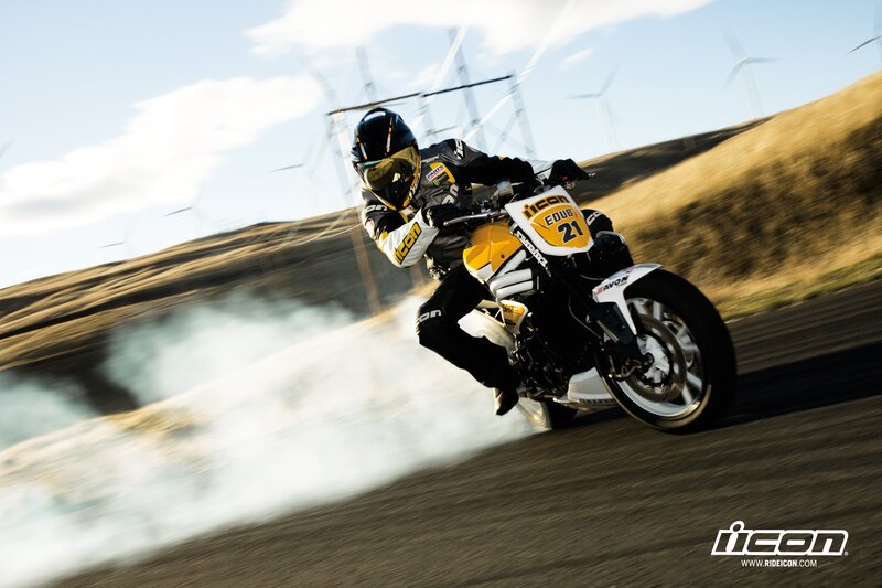 Motorcycle Racer on Track — Yellow, Dynamic, Afternoon, Photograph, Wind Turbines