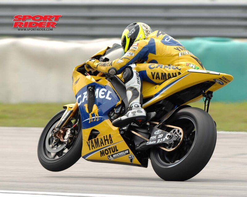 Motorcycle Racer on Track — Yellow, Dynamic, Photograph, Racing Suit, Blue, Black