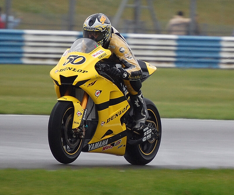 Motorcycle Racer on Track — Yellow