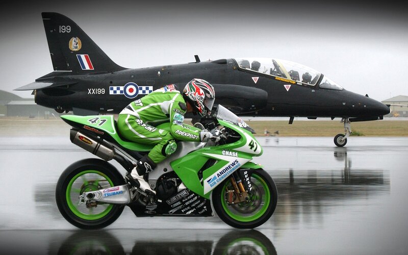 Motorcycle Racer on Wet Tarmac
