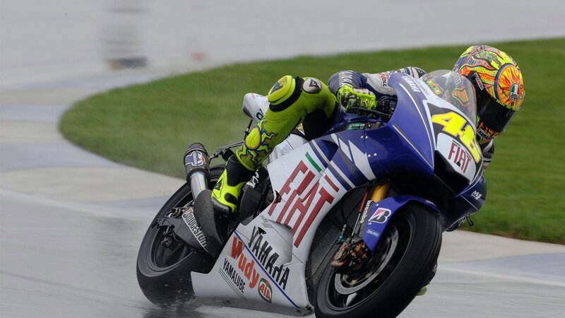 motorcycle racer on wet track