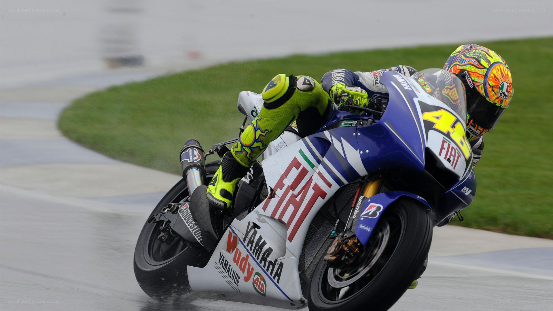 motorcycle racer on wet track