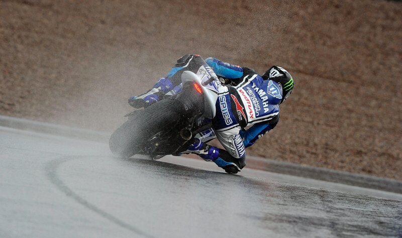 Motorcycle Racer on Wet Track — Blue