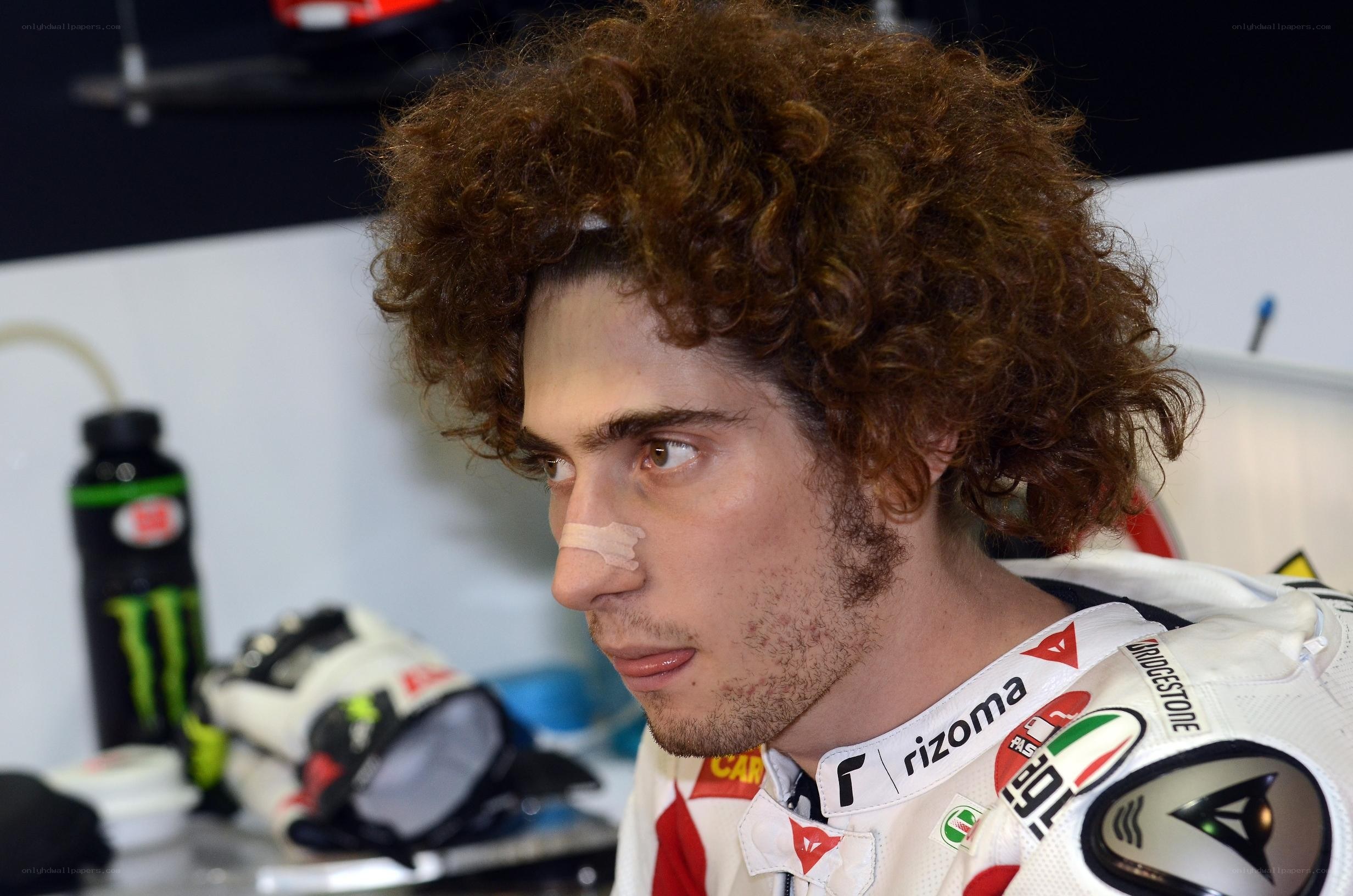 motorcycle racer with bandaged nose