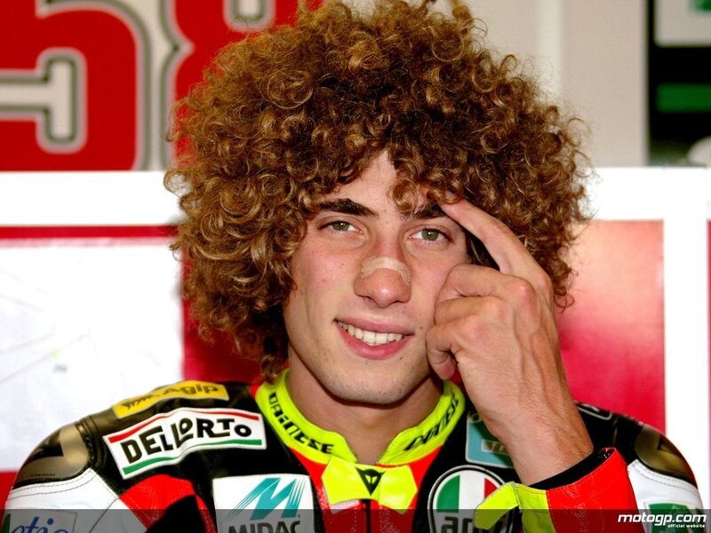motorcycle racer with curly hair