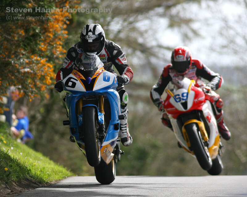 Motorcycle racers on a road