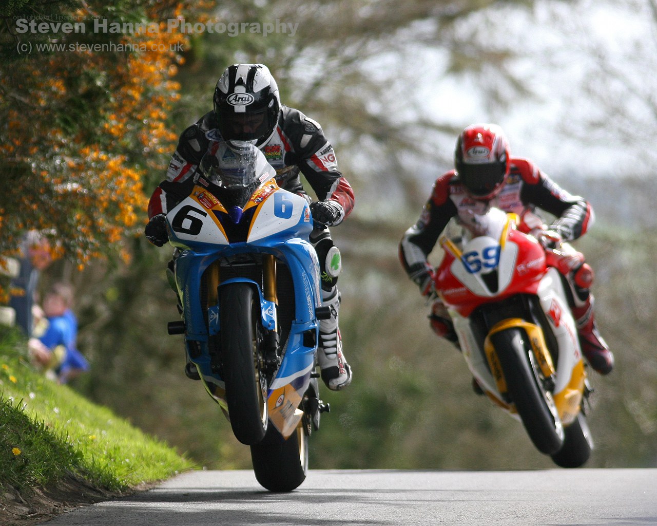 Motorcycle racers on a road
