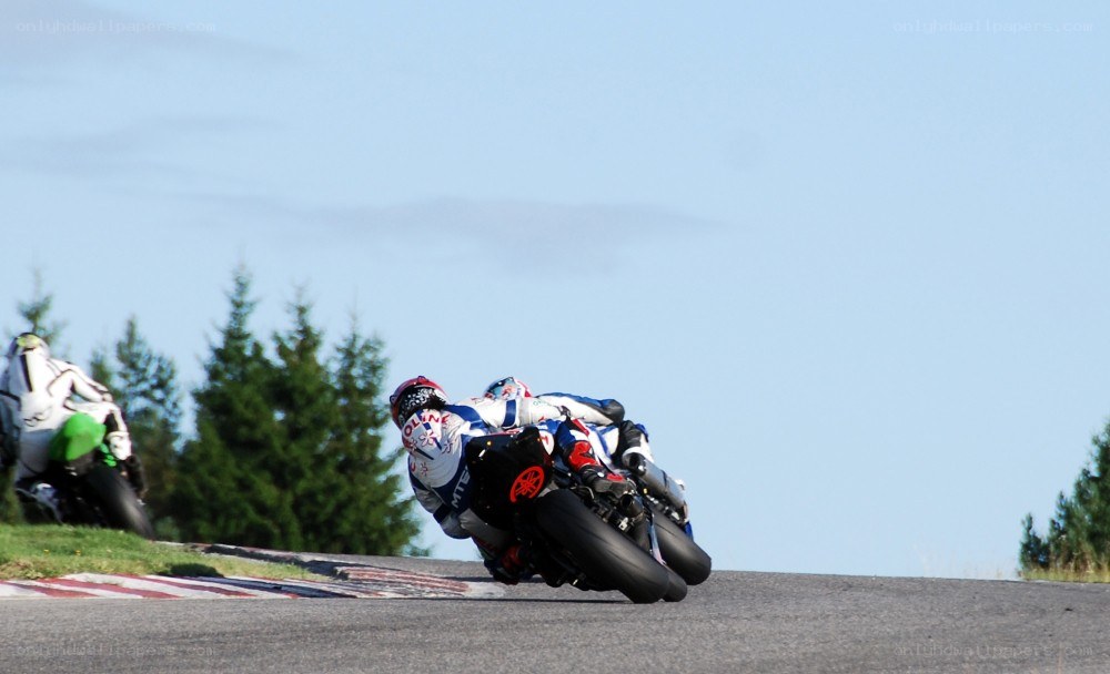 Motorcycle racers on a track
