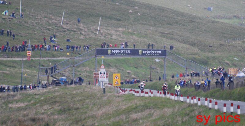 Motorcycle Racers on Hill