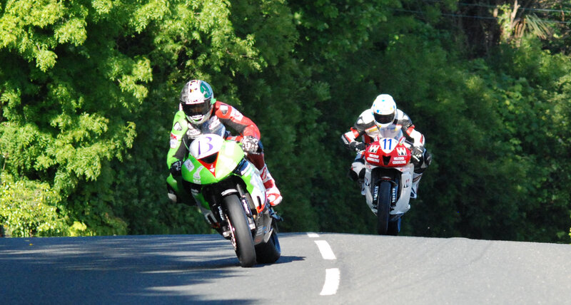 Motorcycle Racers on Road — Green