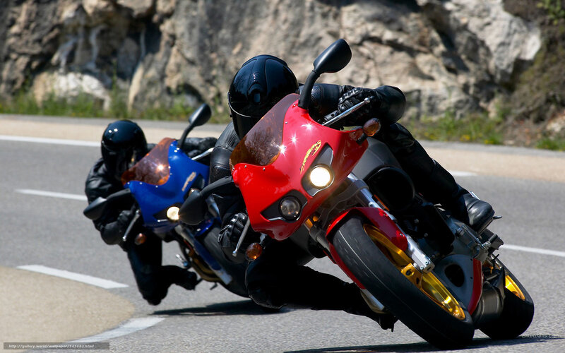 Motorcycle Racers on Road — Red