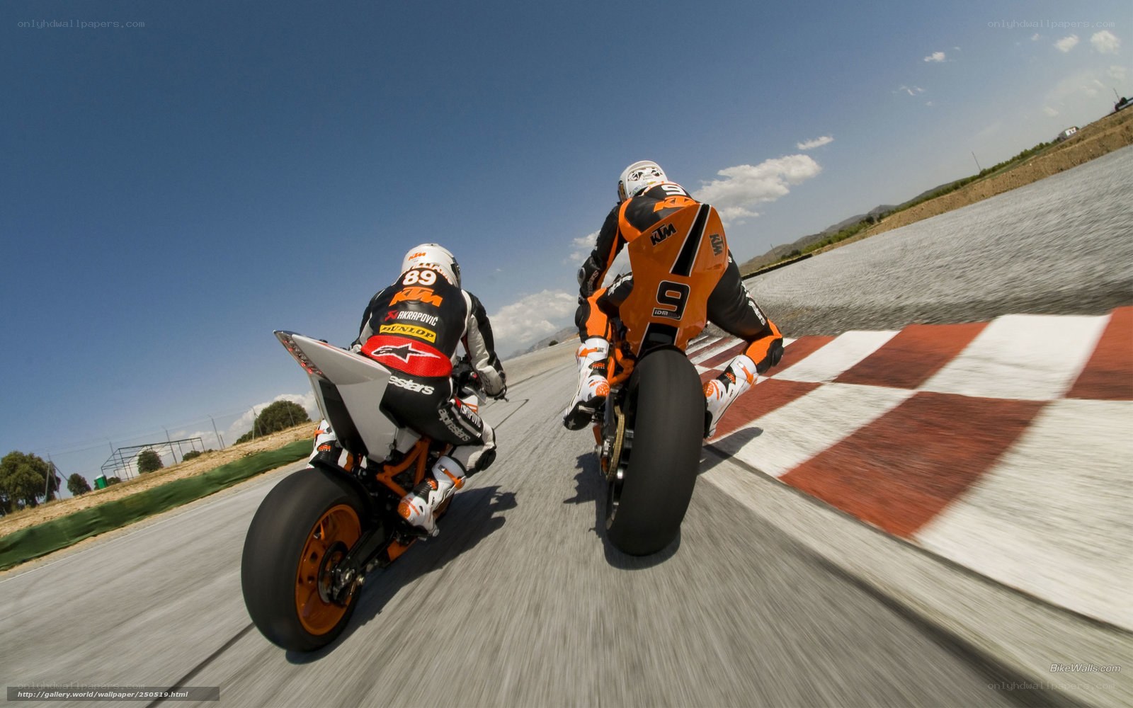 Motorcycle racers on track