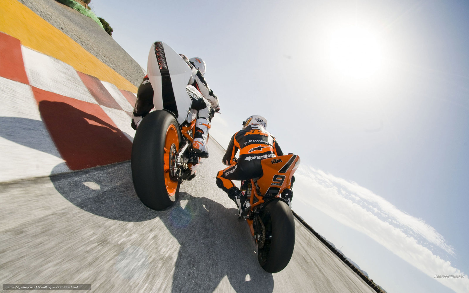 Motorcycle racers on track