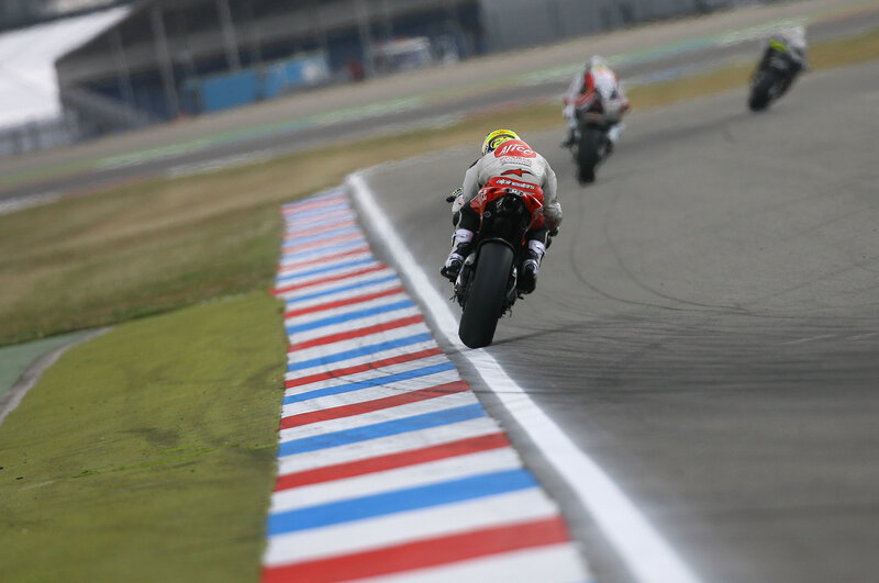 Motorcycle racers on track