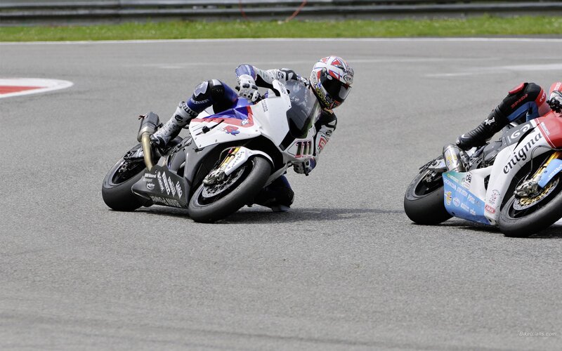 Motorcycle racers on track