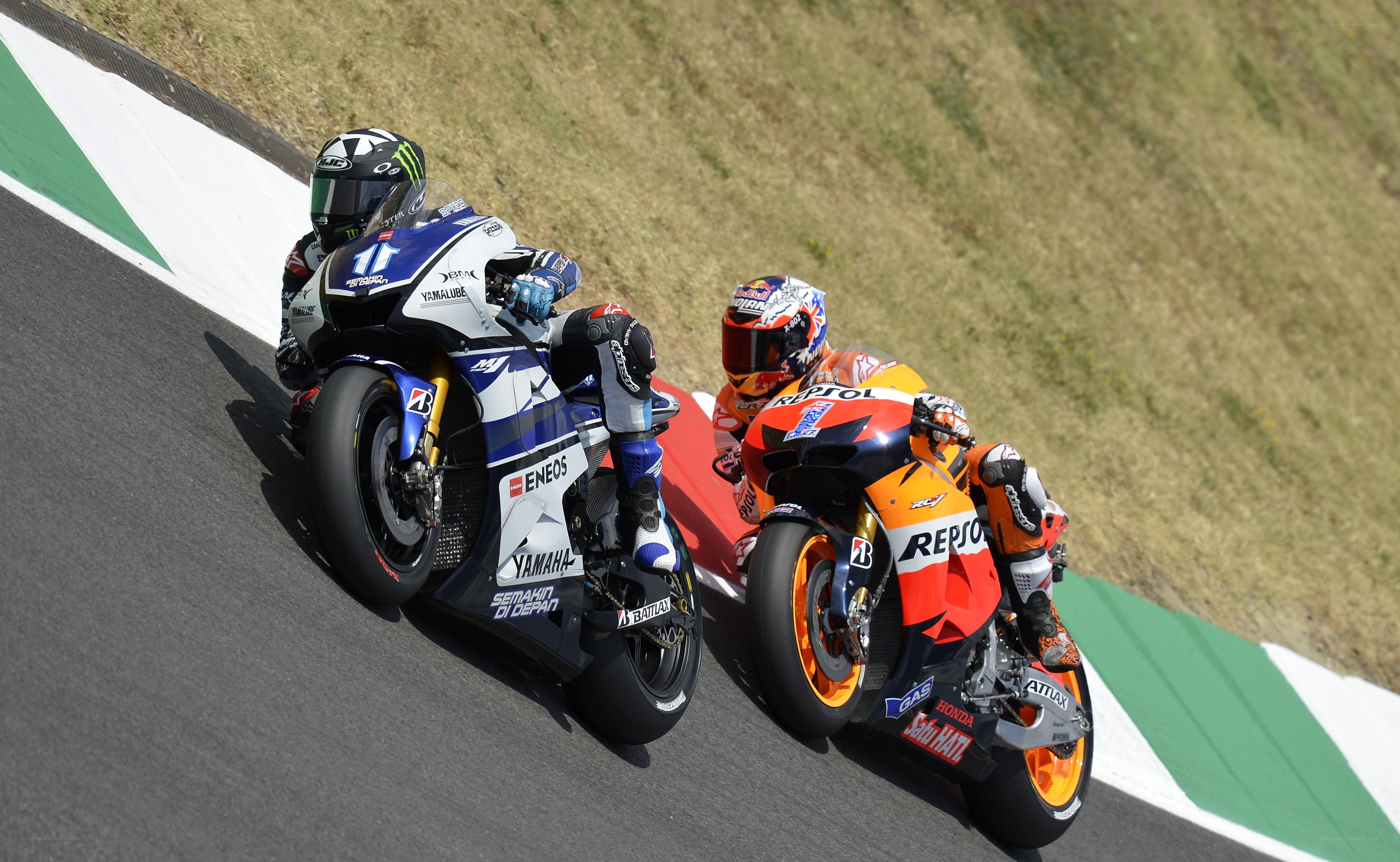 Motorcycle racers on track