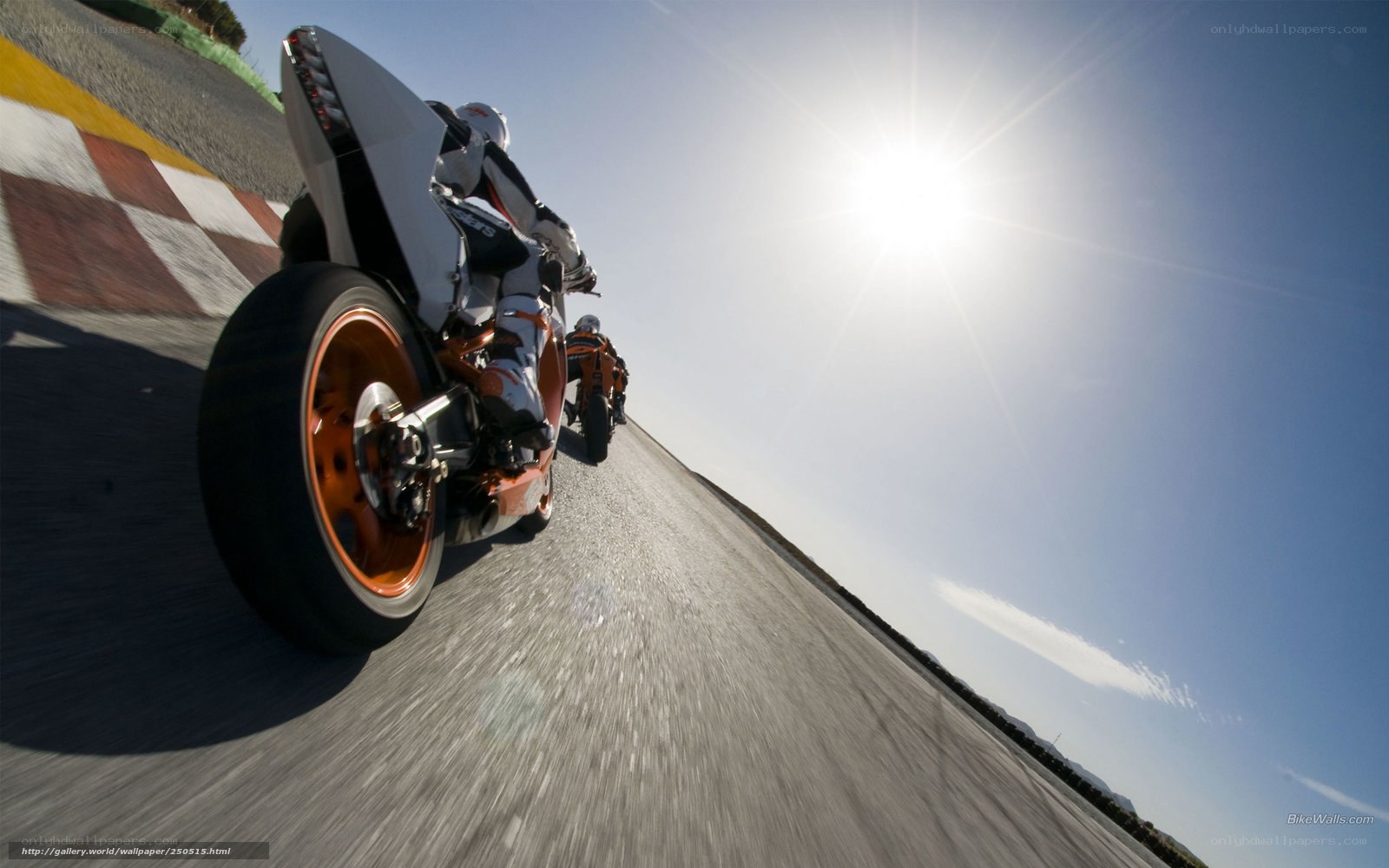 Motorcycle racers on track