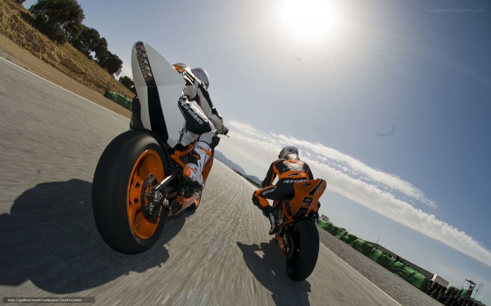 Motorcycle racers on track