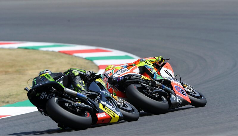 Motorcycle Racers on Track — Black, Dynamic, Afternoon, Photograph, Racing Bikes, Grass, Orange