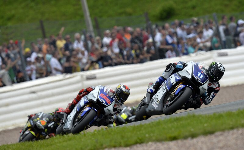 Motorcycle Racers on Track — Blue, Intense, Afternoon, Photograph, Crowd, Racetrack