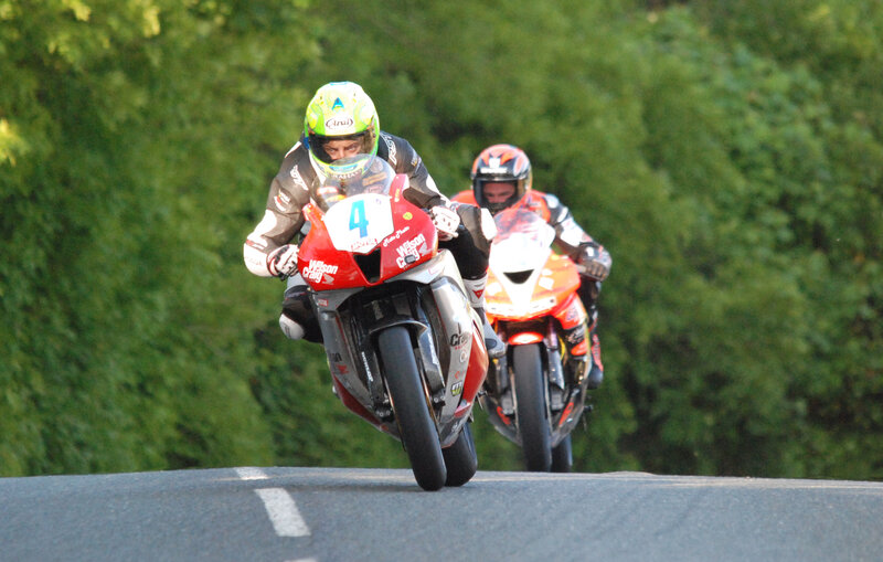 Motorcycle Racers on Track — Green