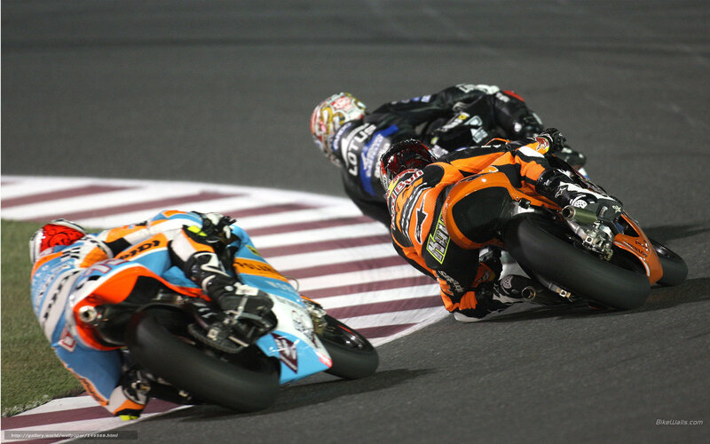 Motorcycle Racers on Track — Orange, Intense, Night