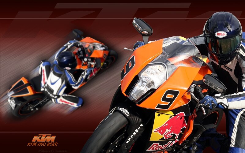 Motorcycle Racers on Track — Orange
