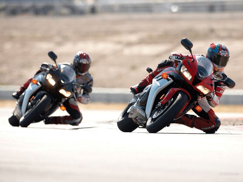 Motorcycle Racers on Track — Red, Dynamic, Afternoon, Photograph, Racing Suits, Helmets