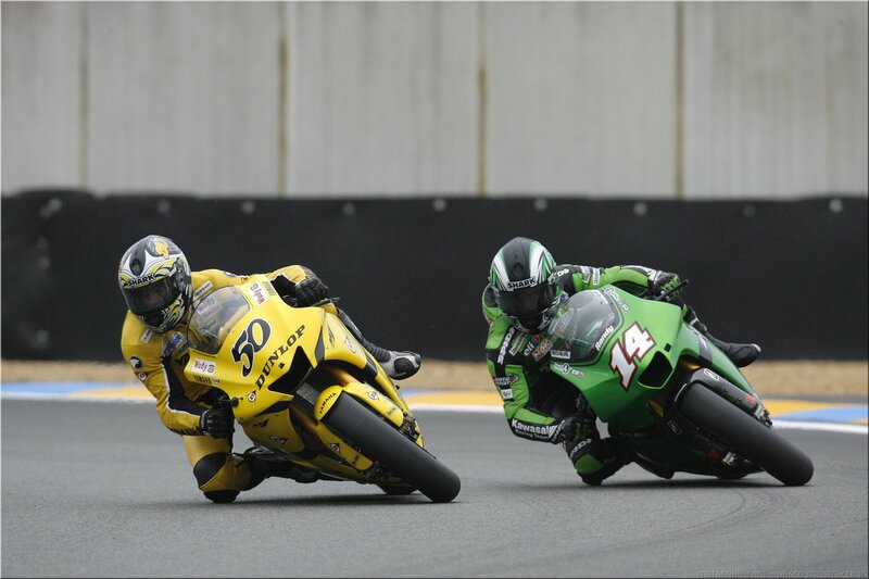 Motorcycle Racers on Track — Yellow, Competitive
