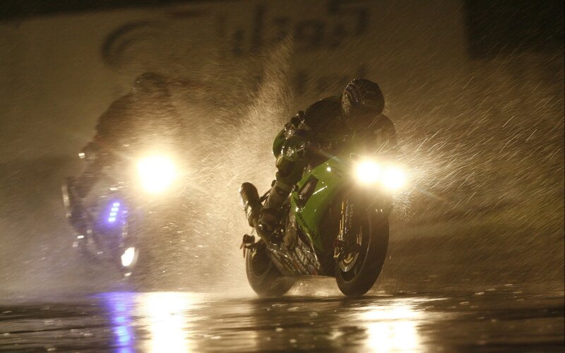 Motorcycle racing in the rain