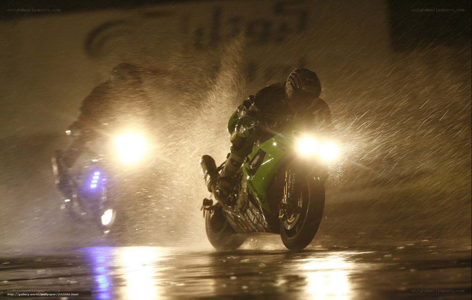 Motorcycle racing in the rain