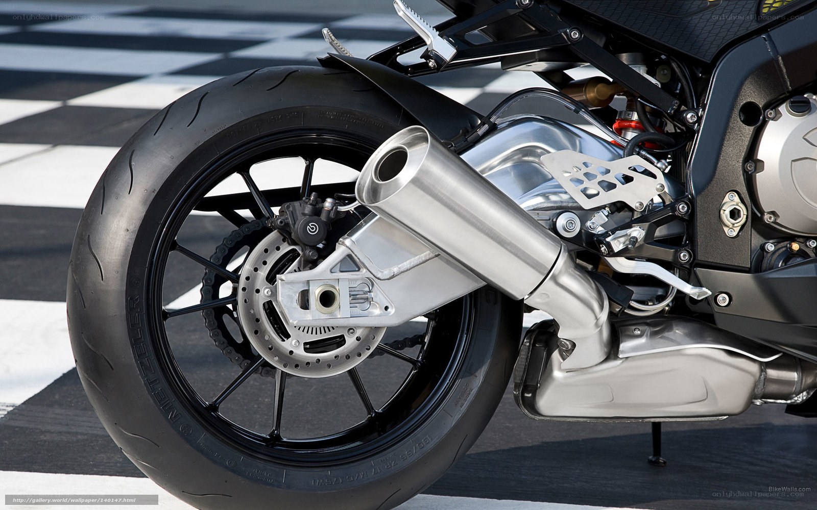 motorcycle rear wheel and exhaust