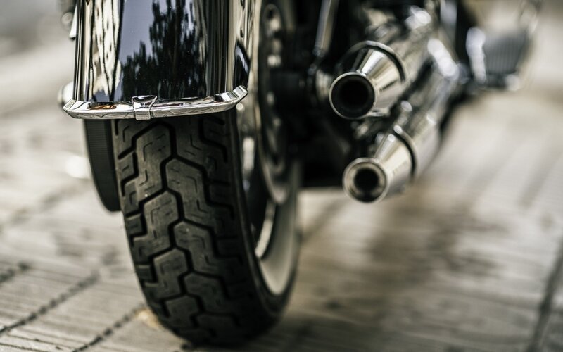 motorcycle rear wheel and exhaust
