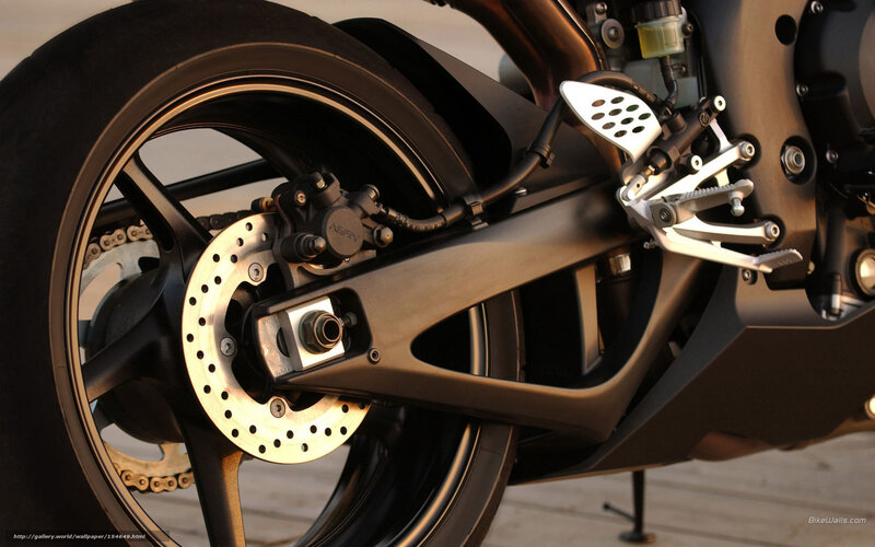 Motorcycle Rear Wheel — Black, Dramatic, Sunset