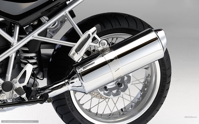 Motorcycle Rear Wheel — Silver, Neutral, Photograph, Exhaust Pipe