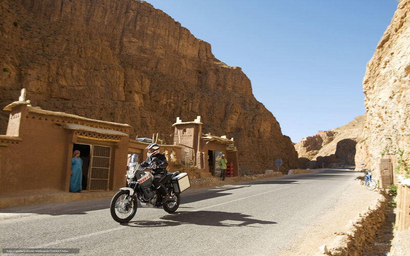 Motorcycle ride through a canyon village