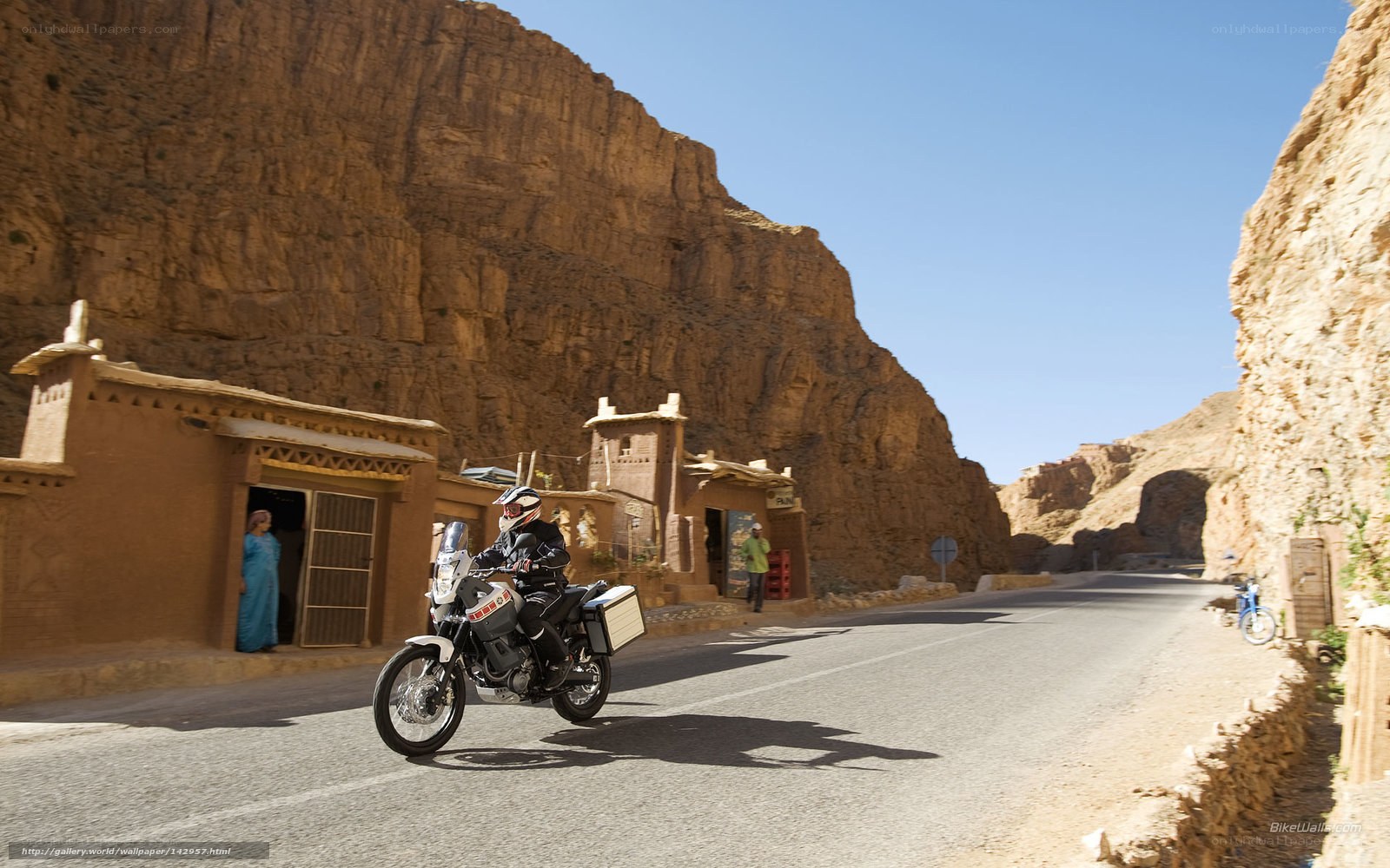 Motorcycle ride through a canyon village