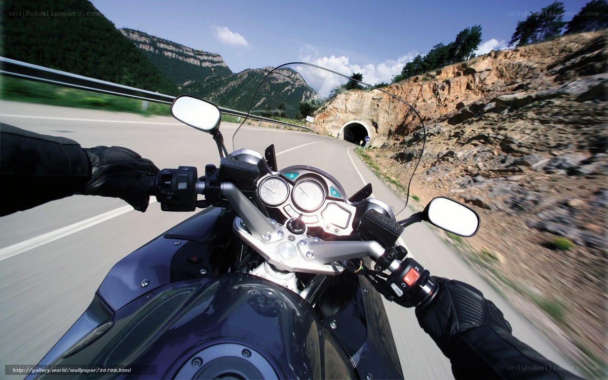 Motorcycle ride through mountain tunnel